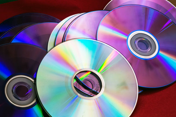A decorative collection of polycarbonate CD discs.