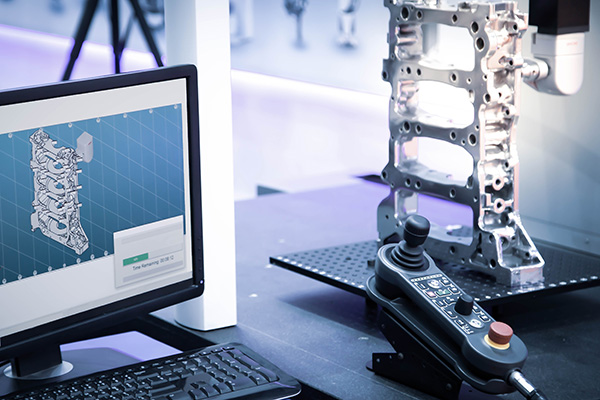 CMM inspecting dimension of engine part